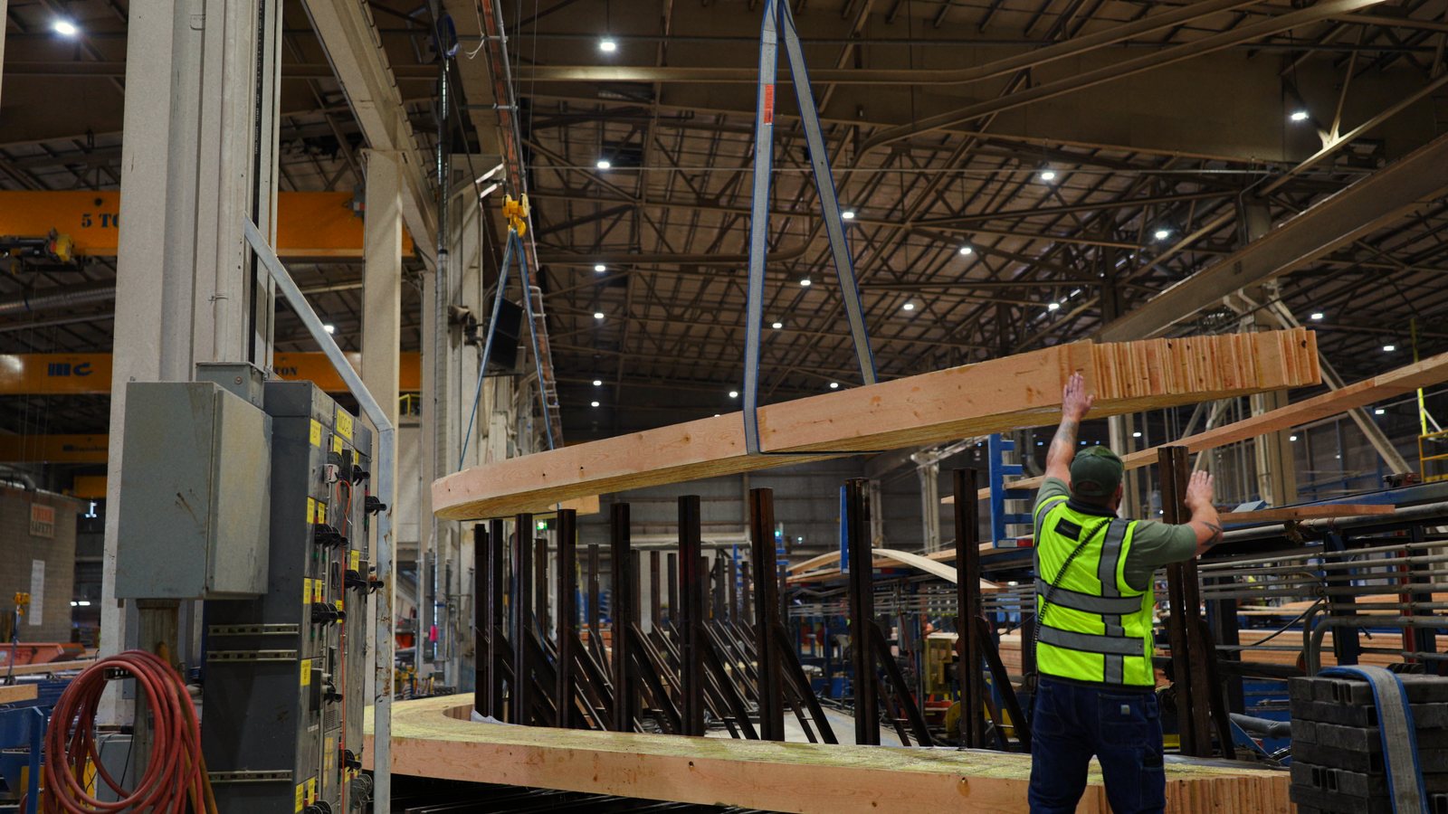 A curved glulam beam on the crane at Zip-O's shop